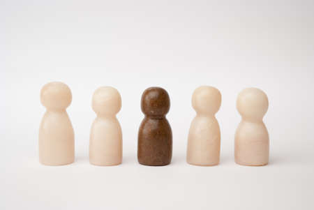 White and brown figures in front of a white backgroundの写真素材