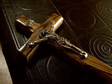 The bible and wooden crucifix with the image  Jesus Christの写真素材