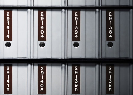 metal P.O. boxes at a post office with numbersの写真素材