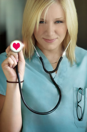 female nurse with stethoscope in her hand