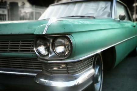 Stylized wide angle detail of an old classic green carの写真素材