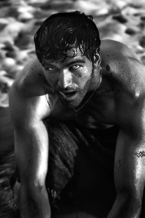 Black and white portrait of hot sexy shirtless guy in the oceanの写真素材