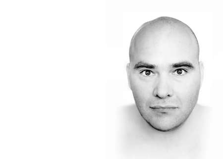 Abstract fine art black and white portrait of a bald manの写真素材