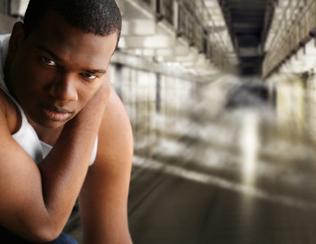 Portrait of a young man in jailの写真素材