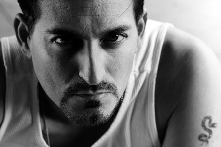 Closeup portrait of a serious dangerous looking man