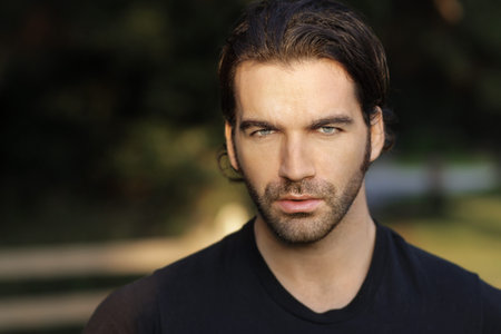 Portrait of  a beautiful man outdoors