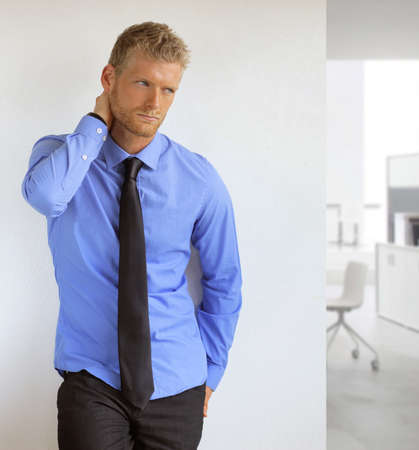 Portrait of a sexy handsome young professional manの写真素材