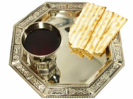 Kiddush wine and matza on silver tray isolated over white