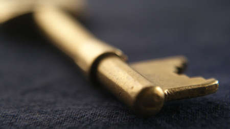 Key Head on a Blue Surfaceの写真素材