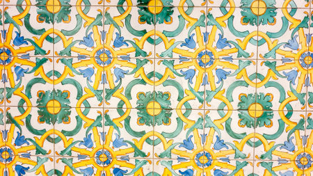 typical colorful Sicilian floor and wall tiles in different patterns and designs with yellow, white, green and blue colorsの写真素材
