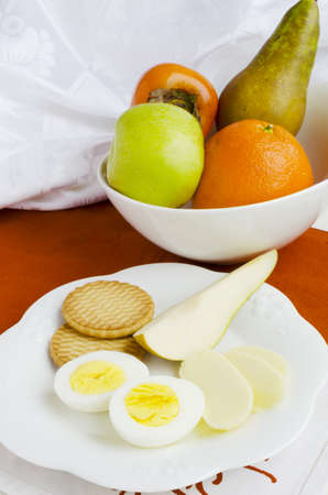 Breakfast  Egg, Cookies, Pear And Babybel Cheeseの写真素材