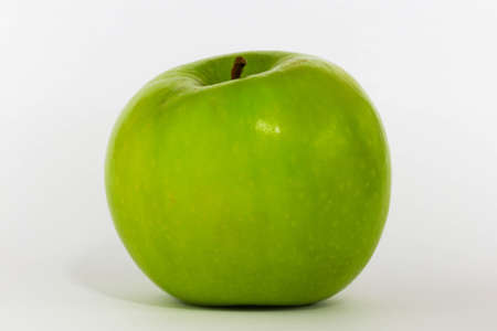 Green Apple isolated on a white backgroundの写真素材