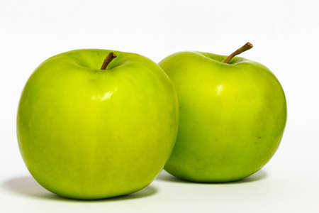 Green Apple isolated on a white backgroundの写真素材