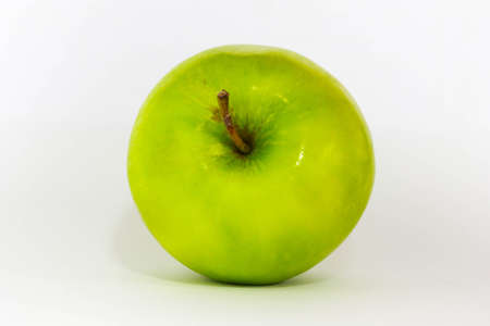 Green Apple isolated on a white backgroundの写真素材