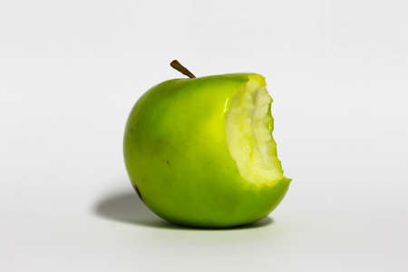 Green Apple isolated on a white backgroundの写真素材