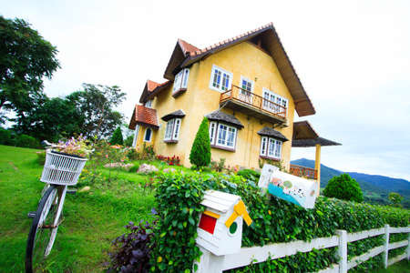 beautiful house on a background of mountainsのeditorial素材