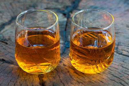Golden Brown Whisky on the rocks in a glass