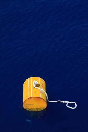 warning buoy off the coast of Maine against a foggy background, Buoy on the sea for support supply boat の写真素材
