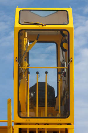 Cabin of crane driver, Crane driver operation in the cabin and in the cabin have a lot of equipment to control crane, Many equipment installed in the cabin for help and support crane driver.の写真素材