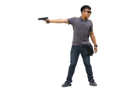 Spy man in the mission, Killer mission, Portrait Of Young Man With Gun On White Backgroundの写真素材