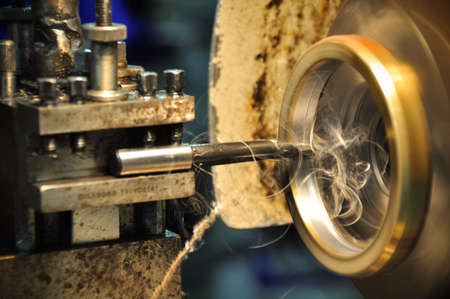 lathe machine in a workshop, Part of the lathe. Lathe machine is operation on the work shop.の写真素材