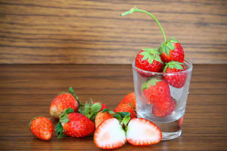 Fresh strawberries, Strawberries in a basket in the garden, Healthy fruitの写真素材