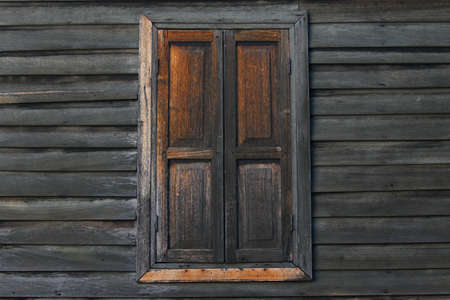 Vintage window. Window of old wooden houseの写真素材