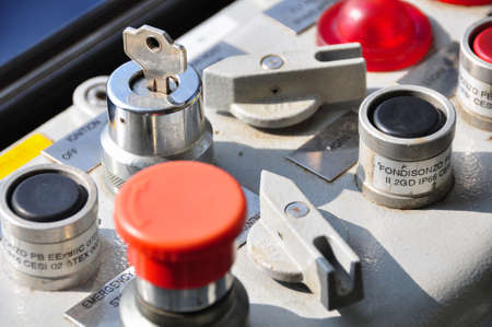 Closeup of control dials on manufacturing machinery or selector switch on control room.の写真素材