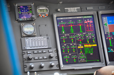 The pilots control panel inside a passenger airplaneの写真素材
