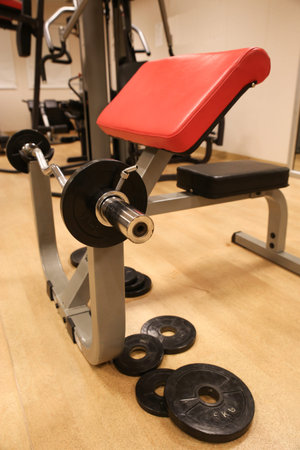 Room with gym equipment in the sport club, sport club gym , Health and recreation room.