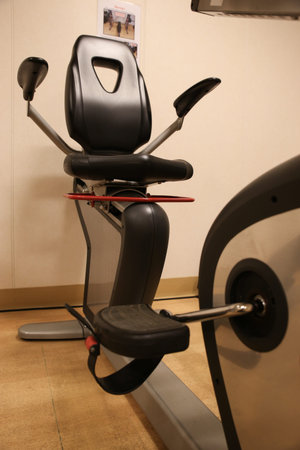 Room with gym equipment in the sport club, sport club gym , Health and recreation room.
