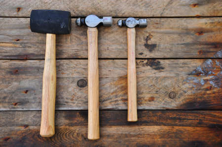 Hammer set of hand tools or basic tools on wooden background.の写真素材