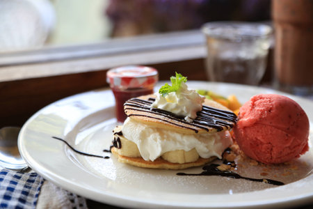 close-up sweet cake set on wooden table.の写真素材