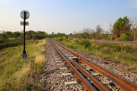 Railway line passing through the green plants. Journey way by train.の写真素材