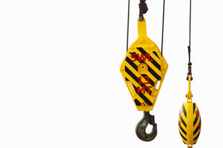 Crane hooks on work site, Crane on Oil and gas platform for transfer cargo and Controlled by Crane operator. Crane background and empty area for text.の写真素材