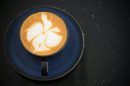 Fresh coffee on wooden table. Espresso coffee short on table. Popular drink set.