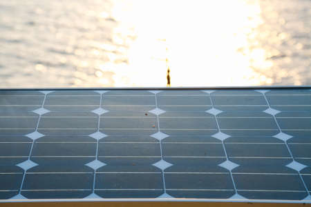 Solar cell installed on the stand for producing the energy to equipment. Green energy in the world.の写真素材