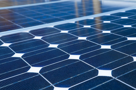 Solar cell generated electrical power by sun light, Closeup of blue photovoltaic solar panels, Green...