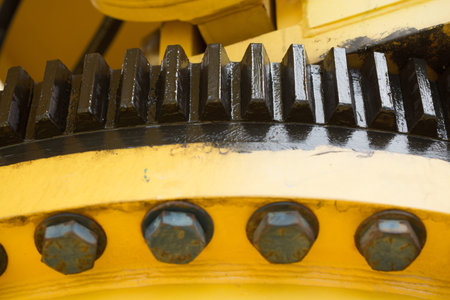 gear on wooden background, Machine parts or spare parts, industry background, old gear or damaged...