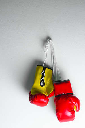Red leather boxing gloves isolated , Boxing gloves background, popular sport for fighter.の写真素材