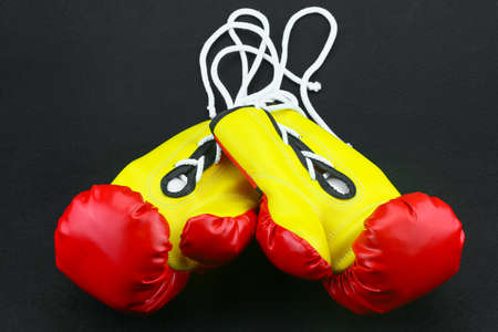 Red leather boxing gloves isolated , Boxing gloves background, popular sport for fighter.の写真素材
