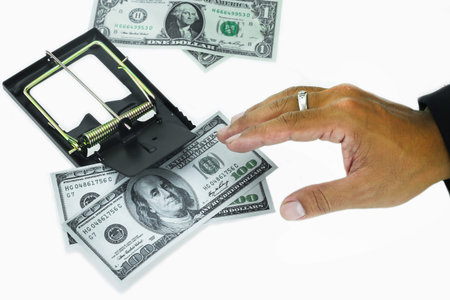 Trap with dollar bills isolated over white background, Risk in business, Businessman taking money...