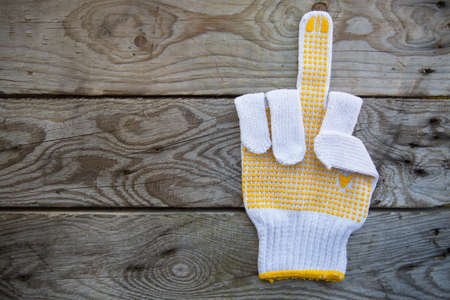 Hand sign in industry job, Industry background and safety concept, communication in the job with the team, safety first with personal protective equipment, feeling of workerの写真素材