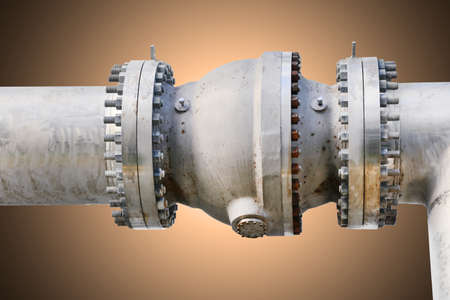 Metal pipe flanges with bolts on an isolated background, Pipe line in oil and gas industry and installed in plant or process.の写真素材
