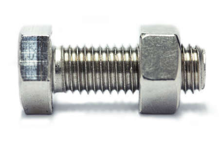 Bolts and nut isolate on white background, Machine equipment in industry job, industry background.の写真素材