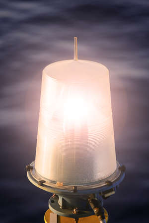 Navigation aid on the platform in offshore, Signal in marine, Light to show subject in the sea on night.の写真素材
