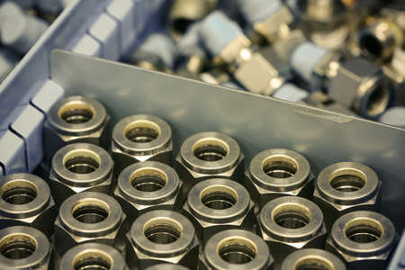 Old bolts or dirty bolts on wooden background, Machine equipment in industry work. industry equipment and tools for work.の写真素材