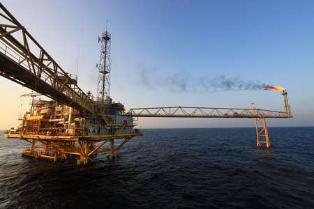 Offshore construction platform for production oil and gas. Oil and gas industry and hard work industry. Production platform and operation process by manual and auto function from control room.の写真素材