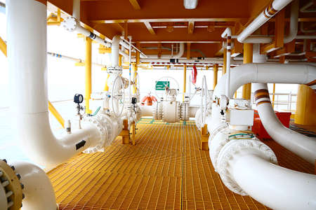 Valves manual in the production process. Production process used manual valve to control the system, Operator open and close or function the valve for controlled pressure or gas and oil flow rate.の写真素材