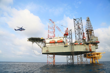 Offshore construction platform for production oil and gas. Oil and gas industry and hard work...